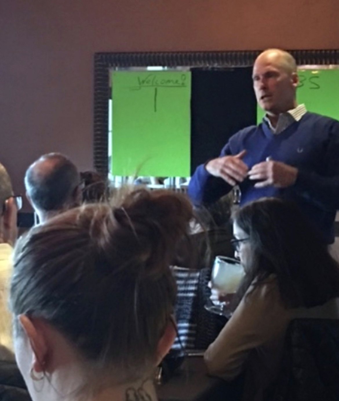 Dr. Jeff Finnigan speaking to a seated room